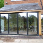 glass bi folding doors and pitched roof